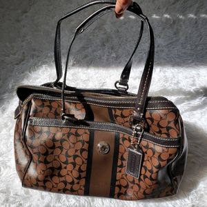 black & brown leather coach duffle logo handbag